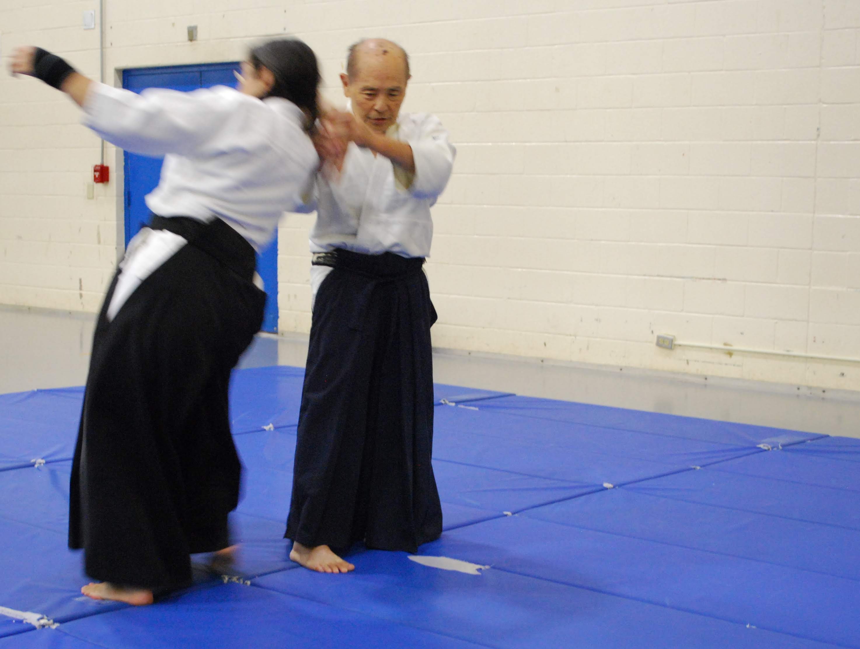 Sensei throwing shihonage